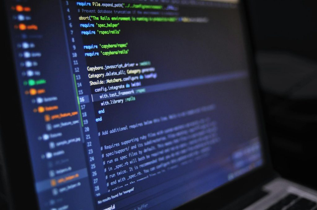 Lines of code in a laptop.