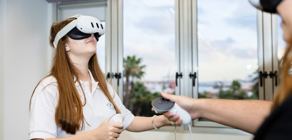 6 Best XR/VR/AR Development Companies in Dubai | 2026 1 Developer testing immersive VR application created by Lasting Dynamics software development team